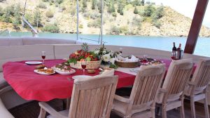 Traditional wooden deck and al fresco dining area on Diamond Lila