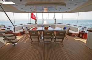 Traditional wooden deck and al fresco dining area on Getaway