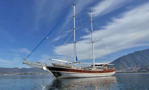 Exterior view of luxury gulet Prenses Selin chartered in Fethiye harbor.