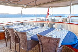 Traditional wooden deck and al fresco dining area on La Bella Vita