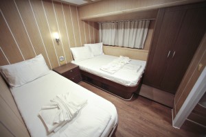 Comfortable and elegant guest cabin aboard Oguz Bey luxury gulet