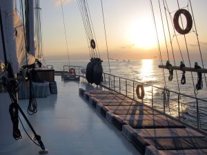 Traditional wooden deck and al fresco dining area on Grand Admiral