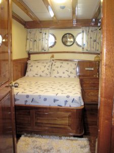 Comfortable and elegant guest cabin aboard Grand Admiral luxury gulet