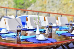 Traditional wooden deck and al fresco dining area on Lycian Queen