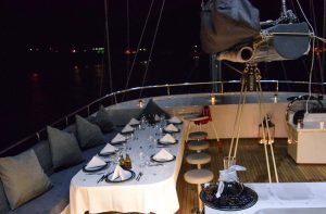 Traditional wooden deck and al fresco dining area on Virtuoso