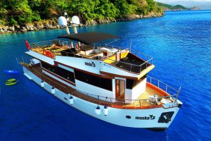 Maske 3 20m luxury motor yacht cruising along the Fethiye coastline