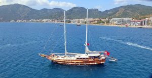 Kaptan Mehmet Bugra 34m luxury gulet cruising along the Marmaris coastline
