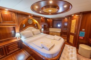 Comfortable and elegant guest cabin aboard Kaptan Mehmet Bugra luxury gulet