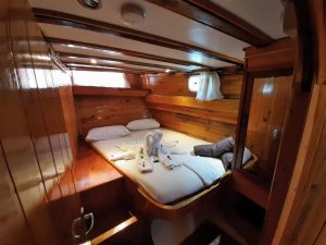 Comfortable and elegant guest cabin aboard Sultan Suna luxury gulet
