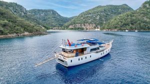 Enjoy Life 26.50m luxury motor yacht cruising along the Gocek coastline