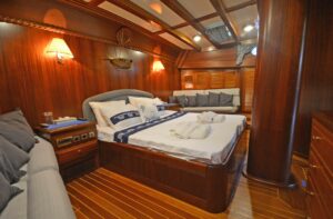 Comfortable and elegant guest cabin aboard Ros Mare luxury gulet