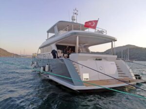 Floki 25m luxury motor yacht cruising along the Gocek coastline