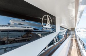 Spacious sun deck and modern outdoor lounge area on Infinity Nine