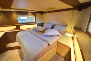 Ultra-luxurious and elegant guest cabin aboard Goldfinger motor yacht