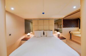 Comfortable and elegant guest cabin aboard The Wall luxury motor yacht