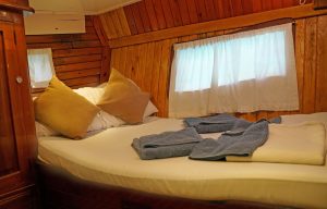 Comfortable and elegant guest cabin aboard Karyalı luxury gulet