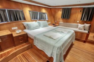 Comfortable and elegant guest cabin aboard Maya luxury gulet