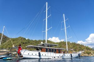 Exterior drone shot of 40-meter luxury charter Gulet Caustic in Gocek bays Turkey.