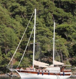 Blue Bird 22m luxury gulet cruising along the Göcek coastline
