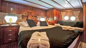 Comfortable and elegant guest cabin aboard Elegance luxury gulet