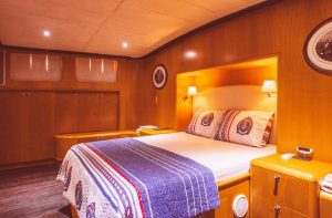 Comfortable and elegant guest cabin aboard Aegean Pearl luxury gulet