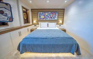 Spacious luxury cabin suite for guests aboard Deep Water superyacht