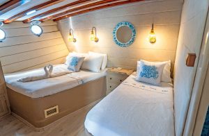 One of the 9 spacious and comfortable guest cabins aboard the gulet Ametist A