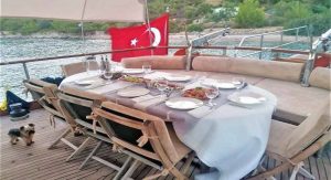 Golden Joy M/S traditional wooden gulet sailing along the Bodrum coastline