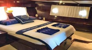 Cozy and traditional wooden interior lounge of the Golden Joy M/S gulet
