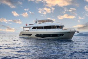 The exterior overview of the twenty-three meter Bay CF Motor Yacht cruising gracefully through the blue waters of Göcek and Mediterranean bays.