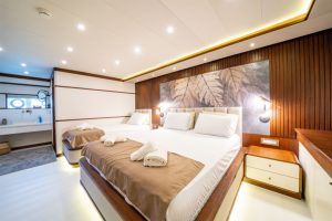 A view from one of the modern and spacious guest cabins of the Bay CF Motor Yacht designed with meticulous comfort details for nine guests.