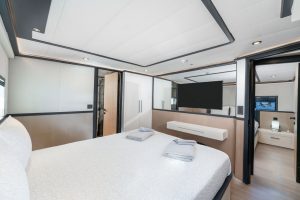 Elegant and comfortable master cabin bedroom setup aboard luxury yacht Calm Down