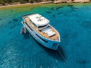 30-meter luxury charter motor yacht Calm Down cruising in the crystal clear waters of Bodrum