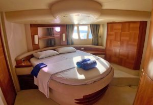 Comfortable and spacious VIP guest cabin aboard the motor yacht Cosmos