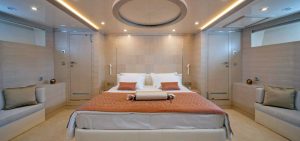 Elegantly designed master guest cabin aboard luxury sailing gulet Love Story featuring rich wood finishes and premium comfort.