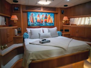 Comfortable and stylish interior cabin accommodation for guests aboard motor yacht Sirocco.