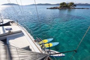 Water skiing, paddleboard, and kayak water sports activities with sailing gulet S/Y Vivere