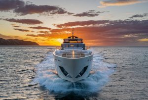 2023-built 30.13m luxury motor yacht Spica cruising at high speed in Greece