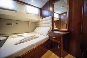 Spacious wooden interior salon with comfortable seating inside luxury gulet ULUCINAR
