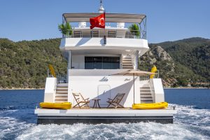 LILA Trawler cruising in the crystal-clear waters of Fethiye Turkey