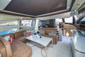 Luxury motor yacht SOMAFIX flybridge seating and sunbathing area