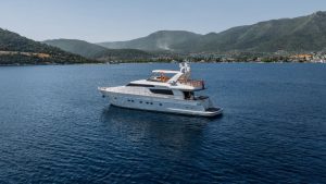 KUUM Motor Yacht 1 Exterior view of the 22.78-meter luxury charter motor yacht M/Y KUUM cruising off Bodrum