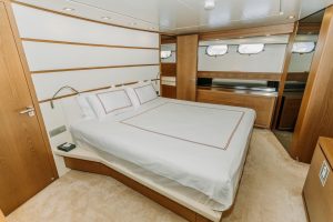 Comfortable, air-conditioned, and luxurious guest cabin of motor yacht M/Y KUUM