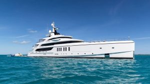 The exterior view of the 65 meter luxury motor yacht Artisan cruising in Greece.