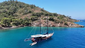 Exterior view of the luxury charter yacht Gulet Esmeralda cruising on the turquoise sea in Fethiye.