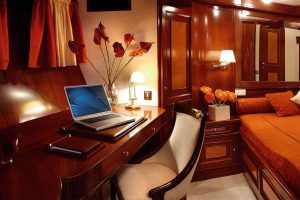 Modernly styled Double stateroom onboard Parea, equipped with high-tech climate control and satellite TV entertainment system.