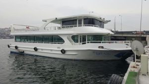 Exterior view of the luxury charter motor yacht Ruya CZ cruising on the Istanbul Bosphorus.