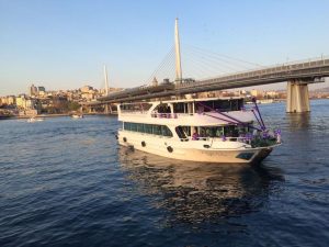 Exterior view of the luxury charter motor yacht Ruya CZ cruising on the Istanbul Bosphorus.