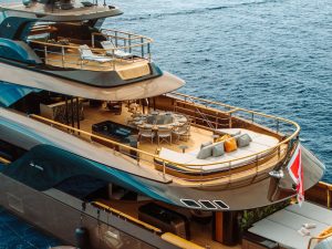 Spacious aft deck sunbathing area and modern exterior design of superyacht Raja